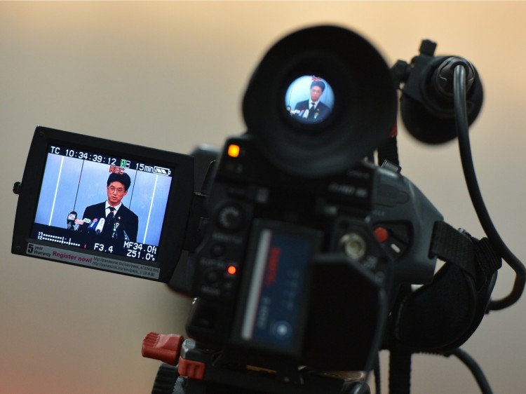 spokesman Yang Yuquan delivering the verdict