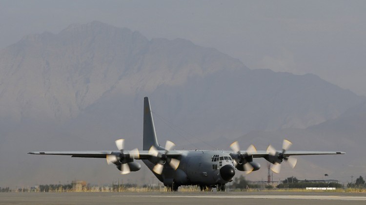 A Lockheed C-130 Hercules preparing for take off at the Kabul International airport, in Kabul. (ALEXANDER KLEIN/AFP/GettyImages)