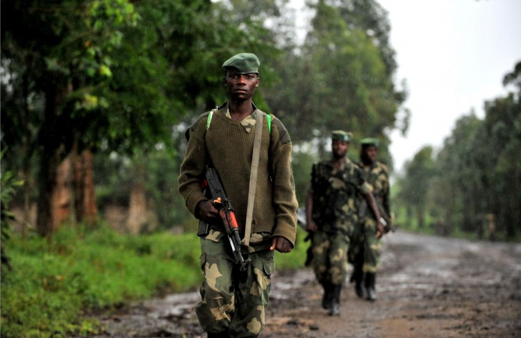 M23 rebel group soldiers patrol on October 17, 2012 in Rangira, near Rutshuru. (Junior D. Kannah/AFP/Getty Images)