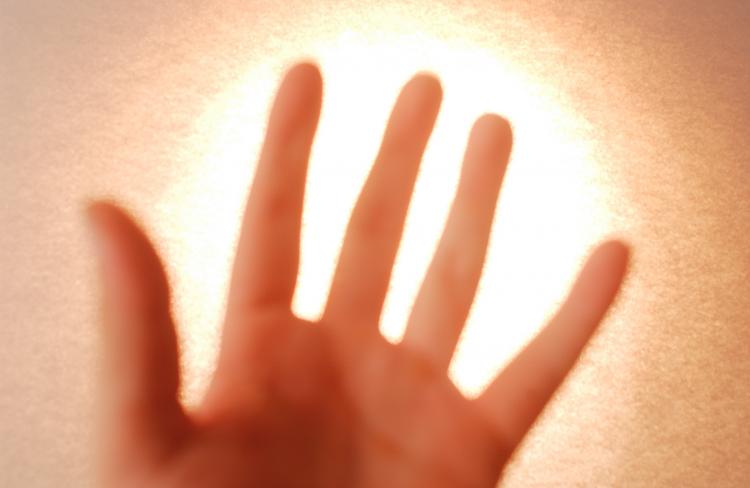 HEALTHY GLOW: Japanese scientists have discovered that the human body actually emits light.   (photos.com)