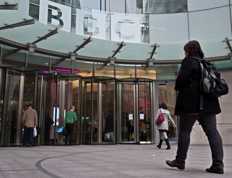 BBC employees arrive for work at the organisation's New Broadcasting House in central London, on November 12, 2012. (Will Oliver/AFP/Getty Images)