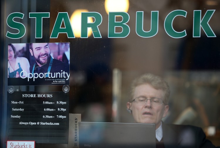 A sign advertising jobs is posted in the window of a Starbucks Coffee shop on Feb. 7, 2013, in San Francisco, Calif. According to a Labor Department report, weekly jobless claims dropped by 22,000 to 344,000 in the week ending on Feb. 23. (Justin Sullivan/Getty Images)