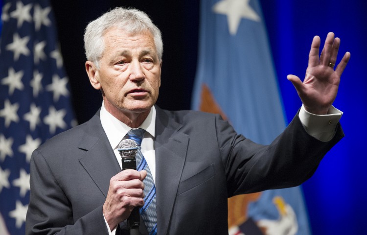 US Secretary of Defense Chuck Hagel speaks to service members and civilian employees during his first day at the Pentagon in Washington, DC, Feb. 27, 2013. (Jim Watson/AFP/Getty Images)