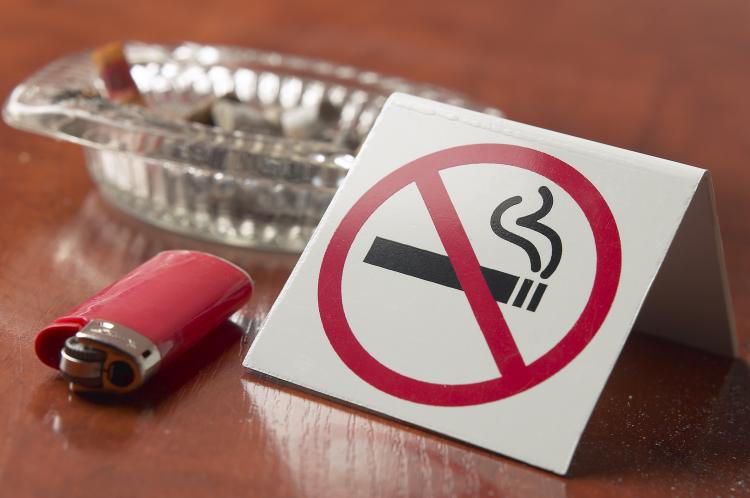 Ontario has banned smoking in vehicles while carrying anyone under 16.   (Photos.com)