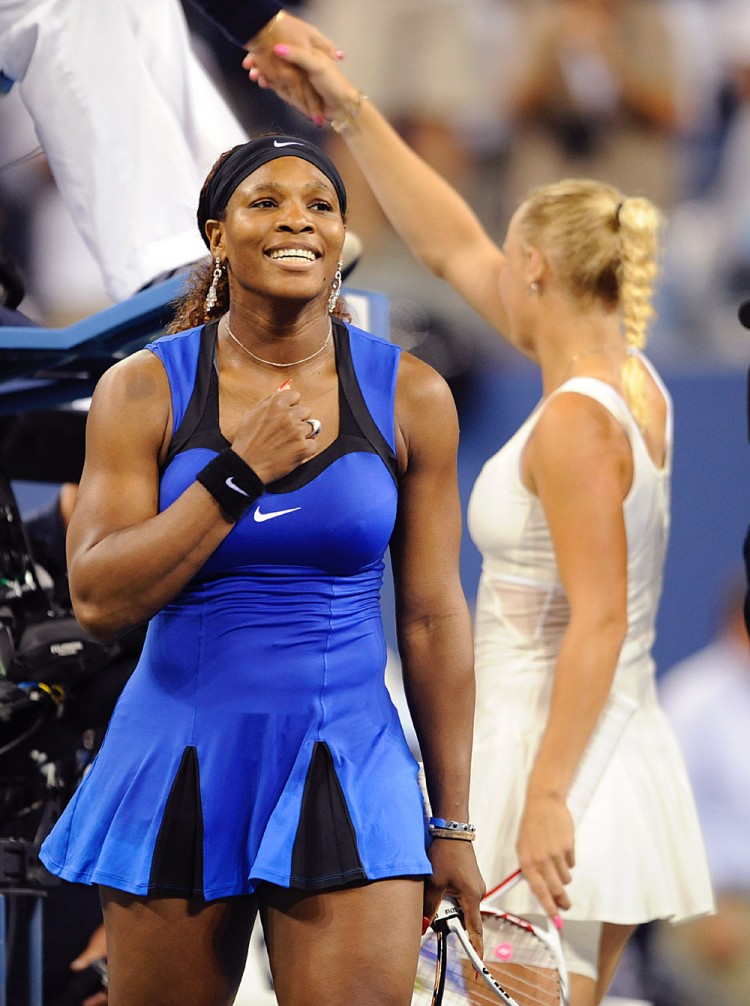 Serena Williams celebrates after beating Caroline Wozniacki in a Women's semifinal match at the US Open tennis tournament. (Henny Ray Abrams/AFP/Getty Images)