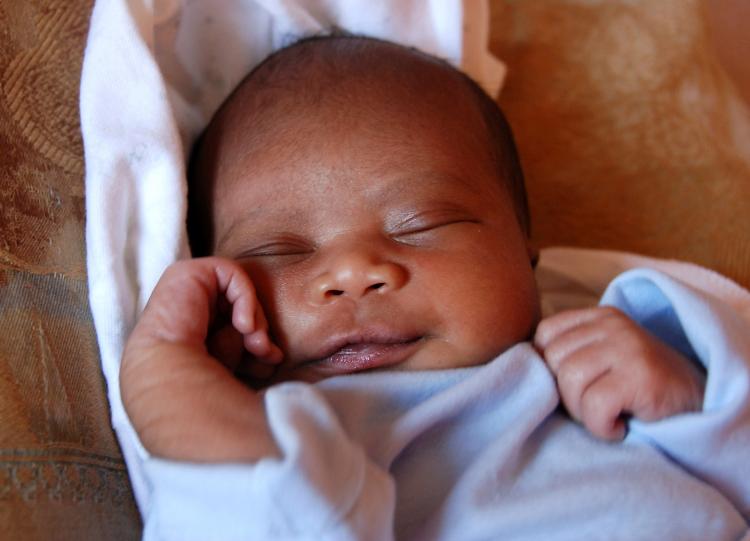 EARLY LANGUAGE DEVELOPMENT: On the first days of their lives, babies already cry in a distinctive tone influenced by their respective mother tongue.  (The Epoch Times)