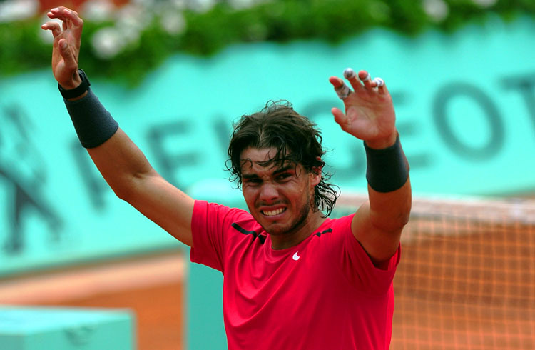 Rafael Nadal cires with joy as he celebrates victory in the French Open men's singles final against Novak Djokovic. (Mike Hewitt/Getty Images)