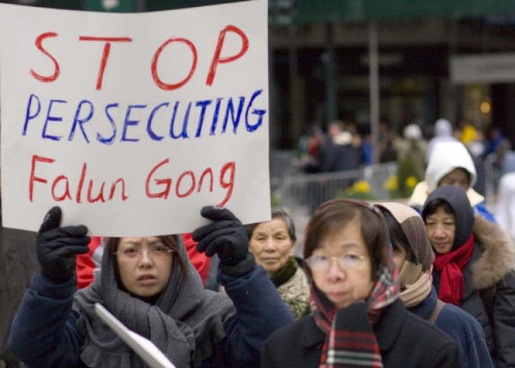 In this file photo, Falun Gong practitioners living outside of mainland China protest against the persecution of their peers prior to the Beijing Olympics. (Jeff Nenerella/The Epoch Times)