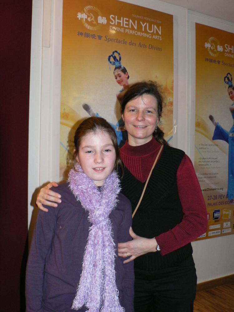 Ms. Moine, a parliamentary assistant, with her daughter, at Divine Performing Arts in Paris. (The Epoch Times)