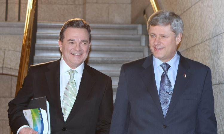 Prime Minister Stephen Harper (R) and Finance Minister Jim Flaherty on Parliament Hill in Ottawa on March 4 to deliver Canada's budget plan for 2010. (The Epoch Times)