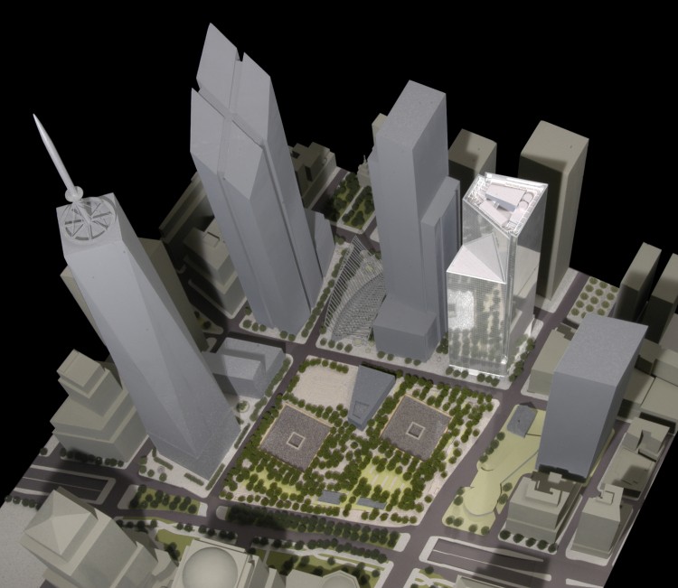A model of the site showing all construction completed, with 4 World Trade Center (WTC) in white. From left to right are 1 WTC, 2 WTC, and 3 WTC; 7 WTC, already completed, is between and behind 1 and 2. (Courtesy of Maki & Asssociates)