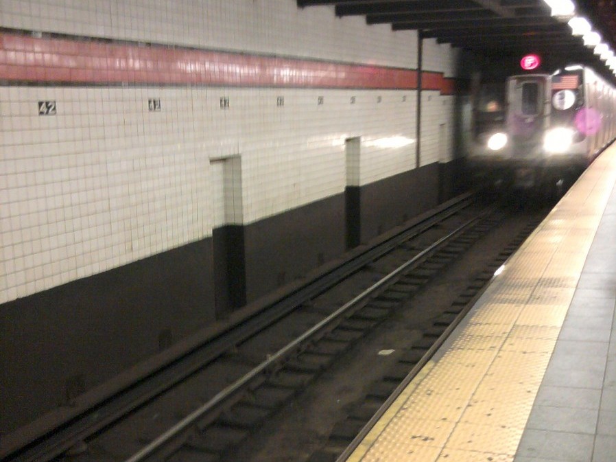 A train is arriving at 42nd St. subway station on June 10.