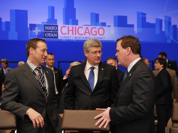Prime Minister Stephen Harper speaks with Defence Minister Peter Mackay and Foreign Affairs Minister John Baird at the International Security Assistance Force meeting on Afghanistan during the NATO Summit in Chicago on Monday. (Mandel Ngan/AFP/Getty Images) 