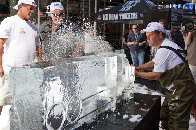 An ice sculptor creates a truck in a block of ice using a chainsaw in 80 degree weather right in the heart of Times Square Thursday. The demonstration was a marketing campaign for History Channel's 