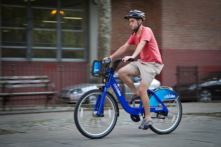 New Yorker Tim Haney, tests out one of the new bikes from the bikeshare program