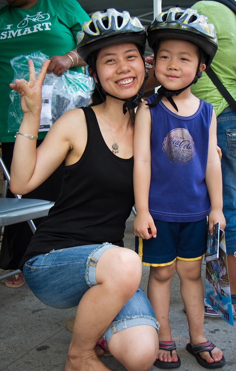 A mother and her son at the Bikeshare Demonstration in Chinatown