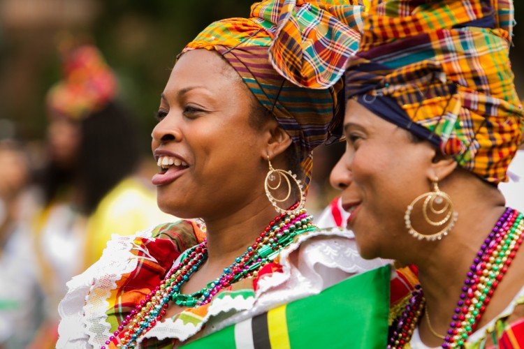 Women dressed in traditional clothing take part in New York's West Indian Day Carnival in Brooklyn on Sept. 3. (Benjamin Chasteen/The Epoch Times)