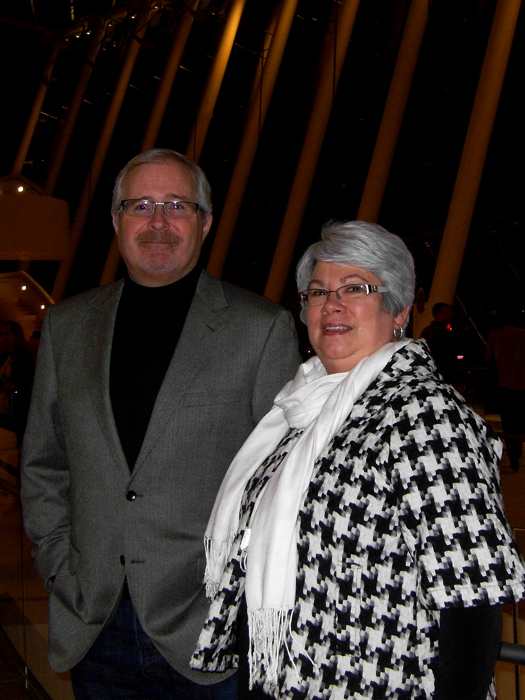 The audience cheered while clapping at the end of the Shen Yun Performing Arts International Company performance at the Kauffman Center in downtown Kansas City, Missouri, on January 24. Greg Anderson, sales manager and his wife, Charlotte Anderson, a librarian were among those in the audience.