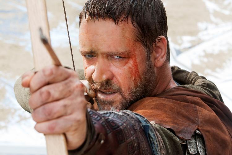 Robin Hood: Russell Crowe takes aim at an enemy in the newest adaptation of Robin Hood, this time directed by Ridley Scott. (Kerry Brown/Universal Studios)