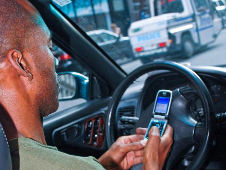 Texting while driving increases accident rate by 23 times, according to a recent study. (Helena Zhu/The Epoch Times)
