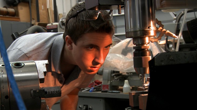 Will builds a part for his robot at the mill.  (Courtesy of Joey Daoud)