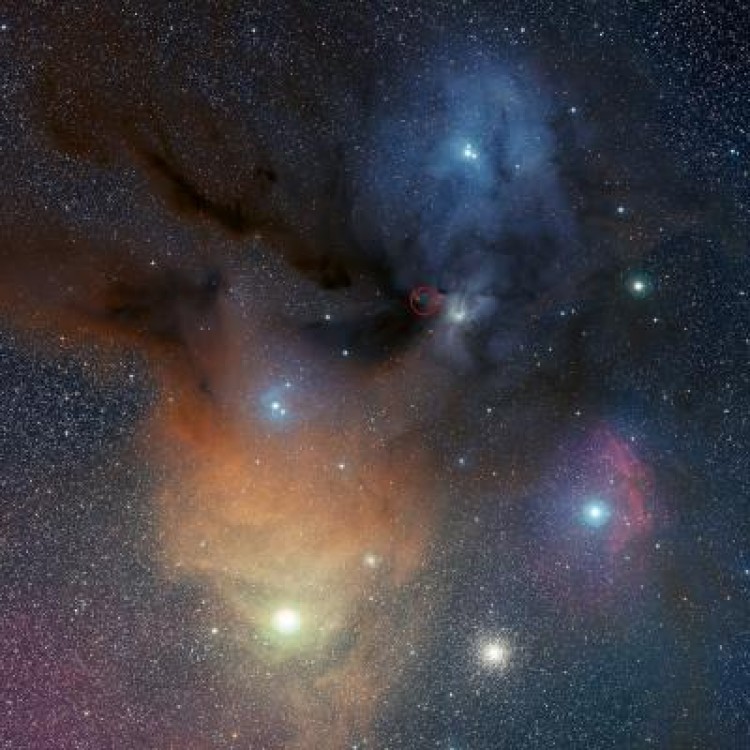 The colorful Rho Ophiuchi star formation region, about 400 light-years from Earth, contains very cold dense clouds of cosmic gas and dust where new stars are being born. (ESO/S. Guisard)