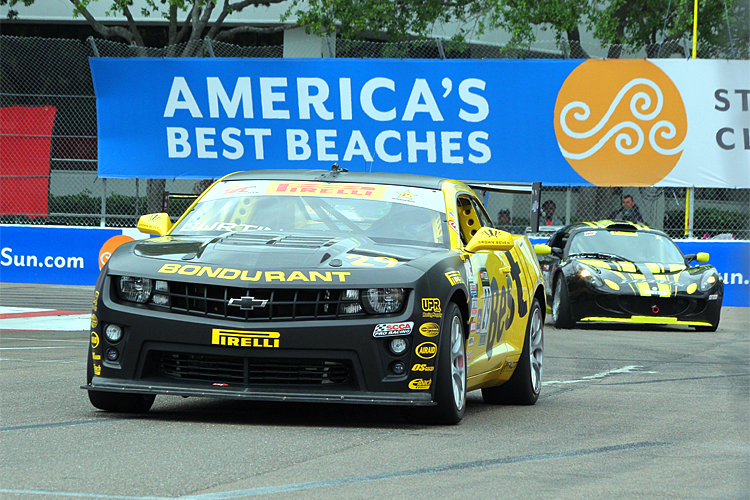 Andy Lee in the Best IT/Chevrolet Camaro leads Jim Taggart in the Lotus USA/Taggart Automotive/LRR Exige around Turn Four at St. Pete. (James Fish/The Epoch Times)