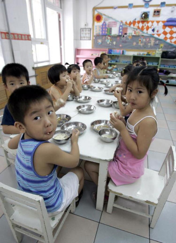 Chinese kindergarten pupils eating breakfast. (Goh Chai Hin/AFP/Getty Images)