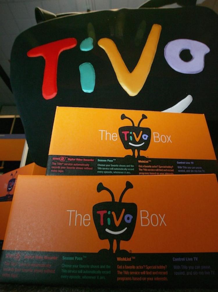 AD KILLER?: A TiVo display with stacked boxes of the digital video recorders. A recent study found that, despite popular belief, the devices do not effect the buying behaviors of consumers.  (Justin Sullivan/Getty Images)