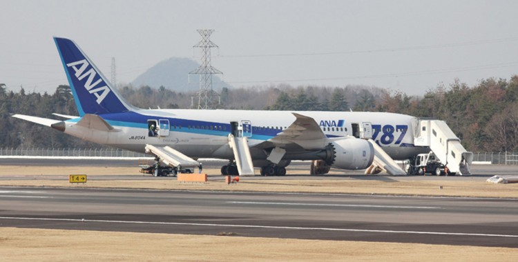 A Boeing 787 Dreamliner sits on the tarmac 