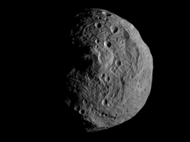 NASA's Dawn spacecraft obtained this image with its framing camera on July 17 from about 9,500 miles (15,000 kilometers) away from the protoplanet Vesta. Each pixel corresponds to roughly 0.88 miles (1.4 kilometers). (NASA/JPL-Caltech/UCLA/MPS/DLR/IDA)