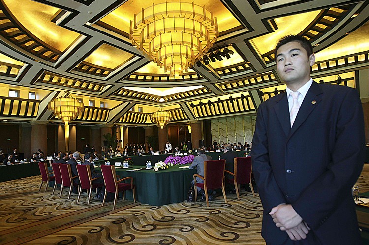 LAST ATTEMPT: A Chinese security personnel looks on during six-party talks on the North Korea nuclear issues. The last round, which ended in failure, were held in July 21, 2008 in Beijing, China. (Ng Han Guan-Pool/Getty Images)
