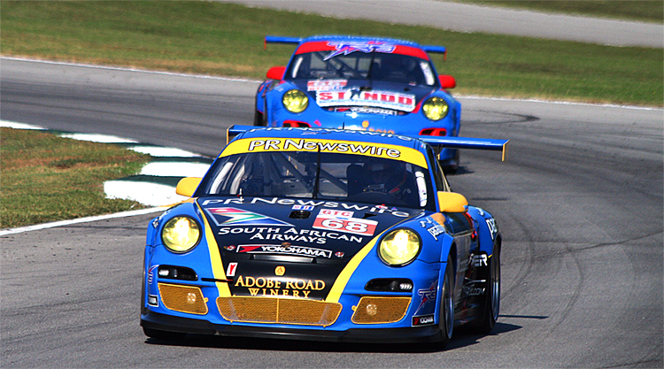 A pair of TRG Porsches in action at Petit le Mans 2011. TRG will enter a single car in the 60th Anniversary Sebring 12 Hours. (James Fish/The Epoch Times)