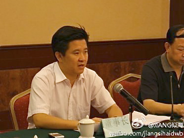 Zhou Shili, speaks to reporters in China.