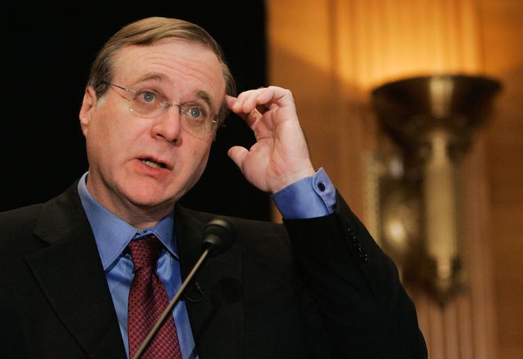 In this file photo, Microsoft co-founder Paul G. Allen speaks during a news conference on Capitol Hill in September 2006 in Washington. Allen's patent holding company, Interval Research, is suing 11 major corporations on grounds of patent infringement.