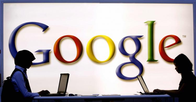 Google both at the Frankfurt Book Fair. Today Google's net income in the first quarter rose 37 percent to $1.96 billion ($6.06 per share), from $1.42 billion ($4.49). (TORSTEN SILZ/AFP/Getty Images)