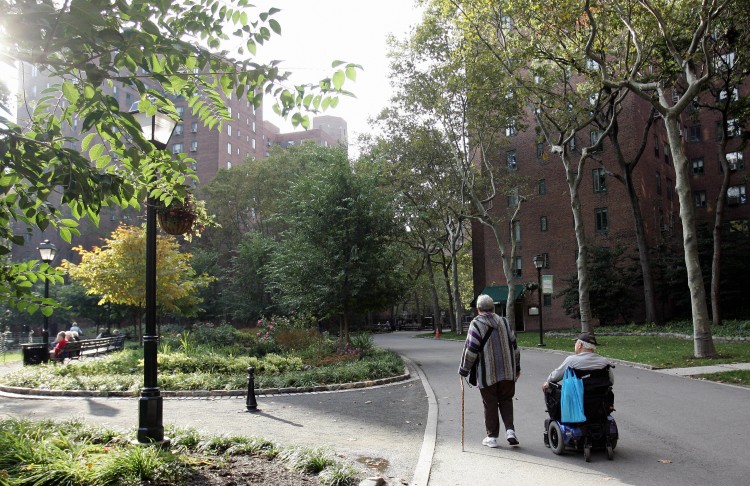 An elderly couple walk in a park in Stuyvesant Town, New York in this file photo. Elderly people are vulnerable to being taken advantage of financially, especially by their own family members. (Don Emmert/AFP/Getty Images)