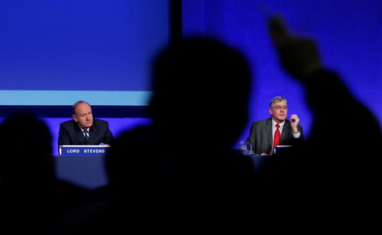 The former Commissioner of London's Metropolitan Police, Lord Stevens (L) and Dick Fedorcio, Director of Public Affairs, Metropolitan Police Service (R) answer reporters' questions during a press conference after an official British police inquiry into the Paris car crash which killed Princess Diana and Dodi Al Fayed on December 14, 2006 in London, (Scott Barbour/Getty Images)