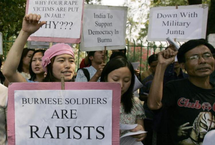 Burmese refugees living in India shout slogans during a protest in New Delhi, 19 March 2007, against the alleged gang rape of four school girls by Burmese soldiers and they alleged rape. Four school girls were allegedly gang raped by Burmese soldiers in P (Manpreet Romana/AFP/Getty Images)