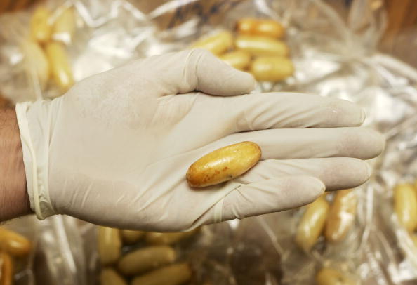 Confiscated capsules containing about 15 grams of cocaine each are displayed at the Brussels Federal Police station on April 24, 2007