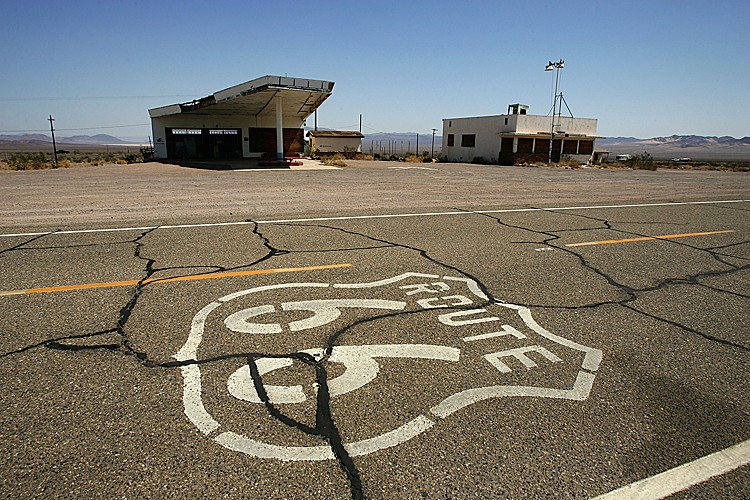 HISTORIC ROUTE 66: Signs of neglect can be seen even on such a historic highway as Route 66, near an abandoned gas station (L) and Cafe on June 16, 2007 in Ludlow, California. (David McNew/Getty Images)