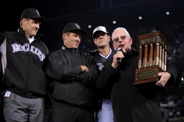 Team President Keli McGregor (L) and team owners Charlie Monfort (M) and Dick Monfort (R) of the Colorado Rockies after their 6-4 win on October 15, 2007.  (Doug Pensinger/Getty Images)