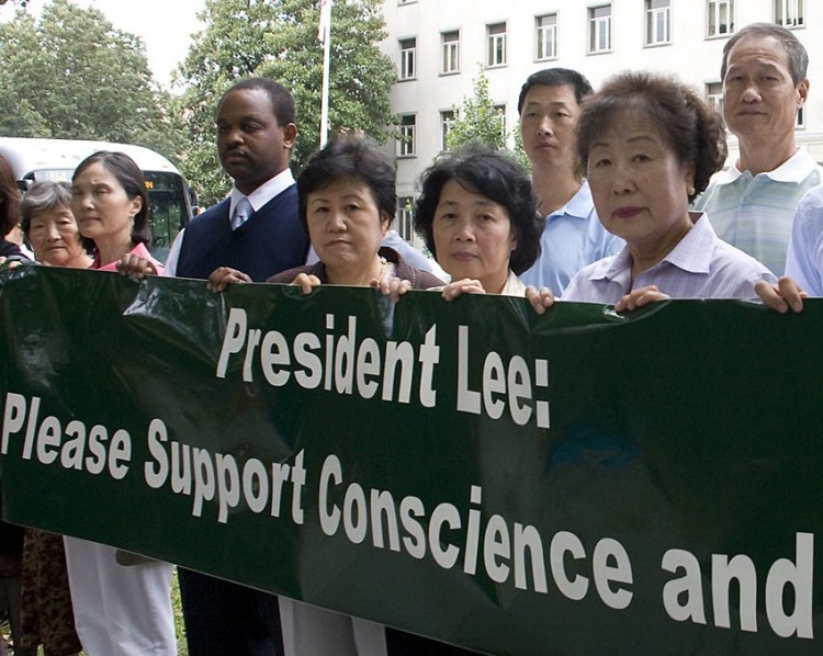 Demonstrators outside the Republic of Korea embassy in Washington, D.C. on Sep. 15 call upon the South Korean government to cease its deportations of Falun Gong practitioners to China where they face being imprisoned, tortured and even death. They said it is against international law to repatriate refugees who will face persecution in China. (Lisa Fan/Epoch Times)