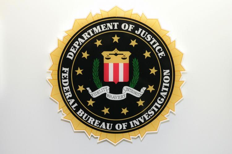 The US Federal Bureau of Investigation, or FBI, under the Department of Justice, logo.  (Saul Loeb/Getty Images)