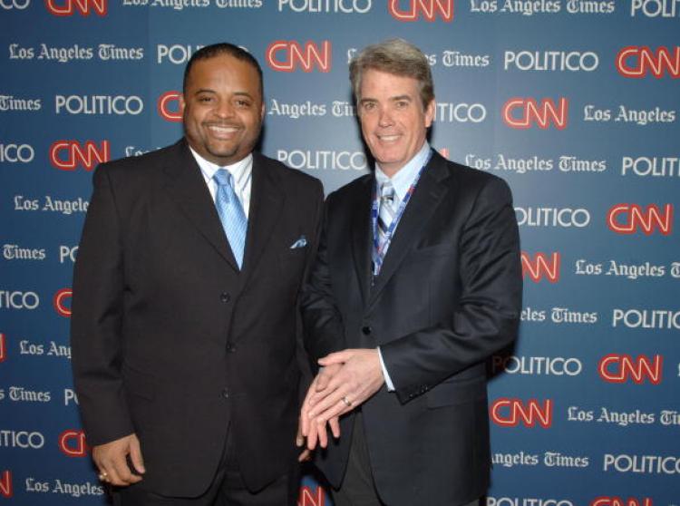 CNN's Roland S. Martin (L) and John Roberts attend the CNN, LA Times, POLITICO Democratic Debate on Jan. 31, 2008 in California.  (Stephen Shugerman/Getty Images for Turner)