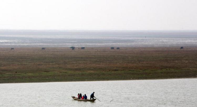 THE EASTERN BERMUDA TRIANGLE: A boat sails in China's Poyang Lake in 2008. Many boats have sunk mysteriously in the Laoye Temple waters of Poyang Lake. (China Photos/Getty Images)