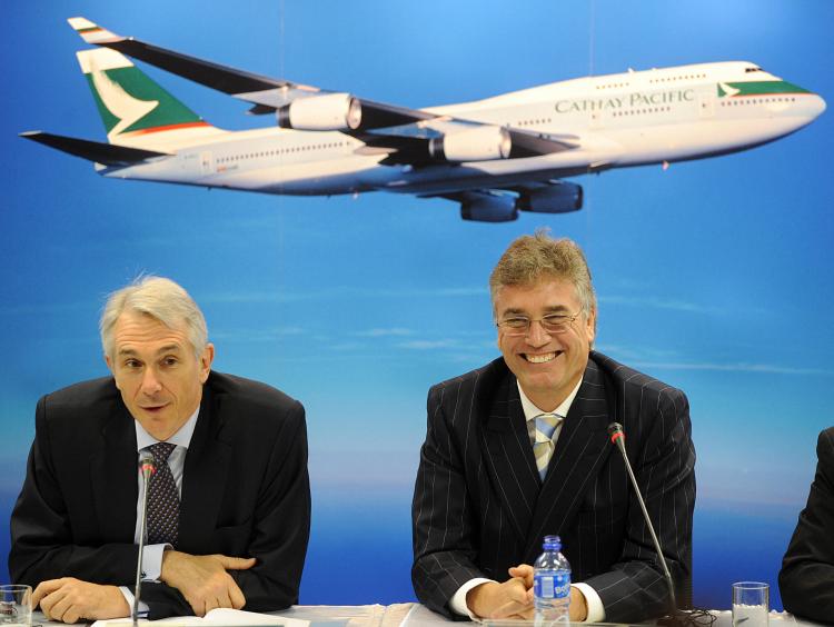 Tony Tyler (L) and Christopher Pratt of Cathy Pacific Airways (Mike Clarke /Getty Images)