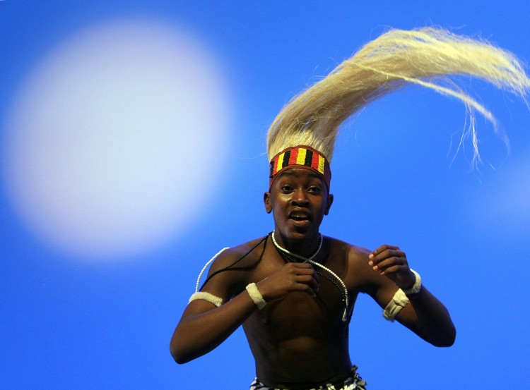 A dancer of an african dance group performs during a dress rehearsal on March 18, 2008.