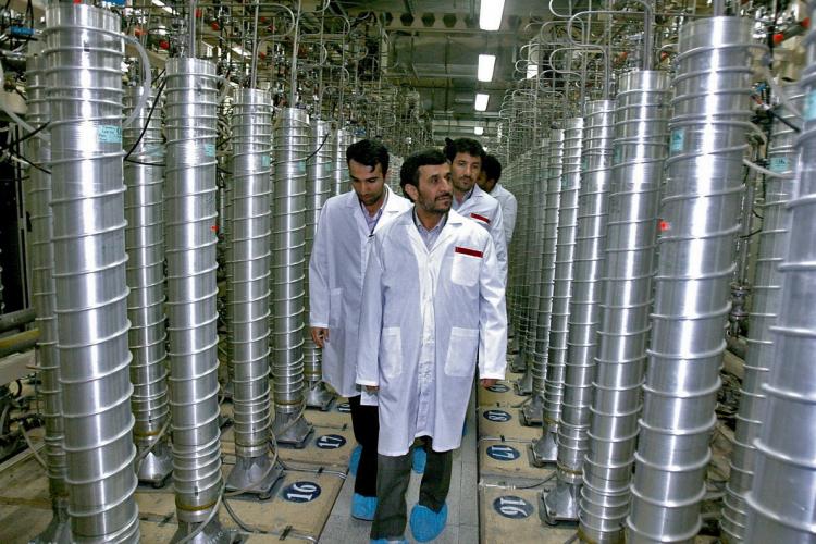 TARGET: Iranian President Mahmoud Ahmadinejad (C) visits the Natanz uranium enrichment facility April 8, 2008. Of the 9,000 nuclear centrifuges at the plant, 1,000 were destroyed by the Stuxnet computer virus. (Islamic Republic of Iran via Getty Images)