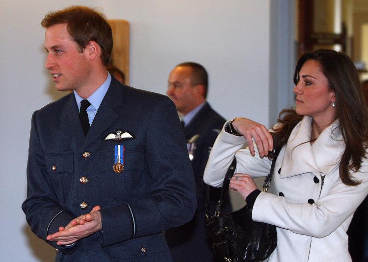 Prince William (L) and Kate Middleton after his graduation ceremony at RAF Cranwell air base in Lincolnshire, on April 11, 2008. (Paul Ellis/AFP/Getty Images)